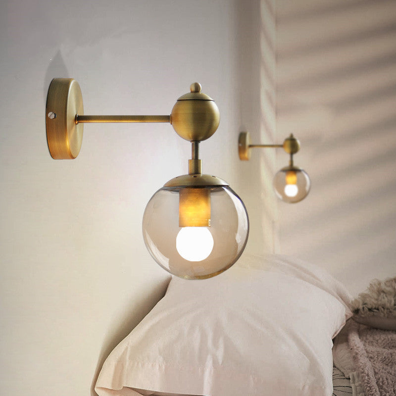 1/2-Head Global Wall Mount Light with Amber Glass Shade Modernist Wall Sconce Lighting in Gold for Bedroom
