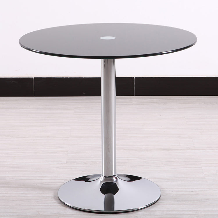 Moderne ronde eettafel van gehard glas met tulponderstel voor eetkamer
