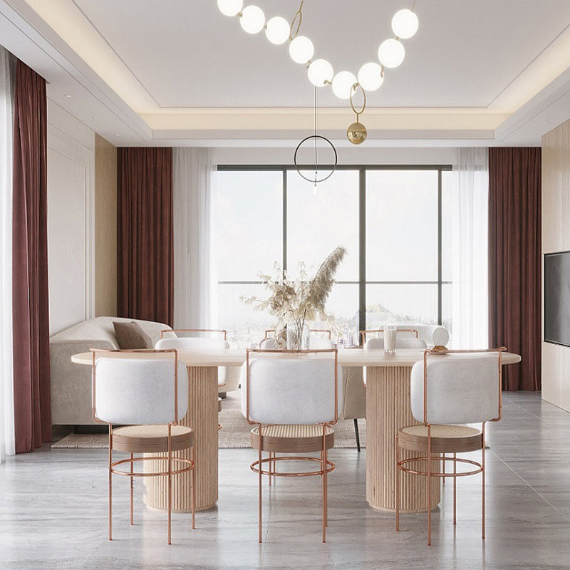 Mesa de comedor minimalista de doble pedestal oval