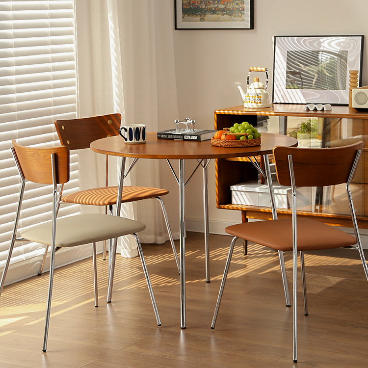 Tavolo da pranzo rotondo contemporaneo Tavolo in legno massiccio con 4 gambe in metallo per la cena in cucina