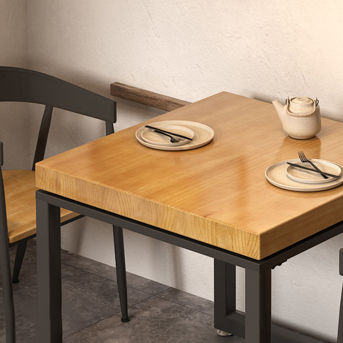Mesa de comedor de madera maciza de estilo industrial Mesa cuadrada marrón con base de metal para comedor