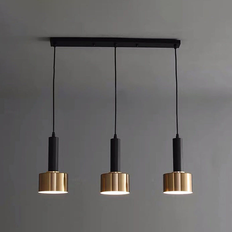 Luce a sospensione in cilindroide nera e oro in ferro battuto in ferro di lusso moderno