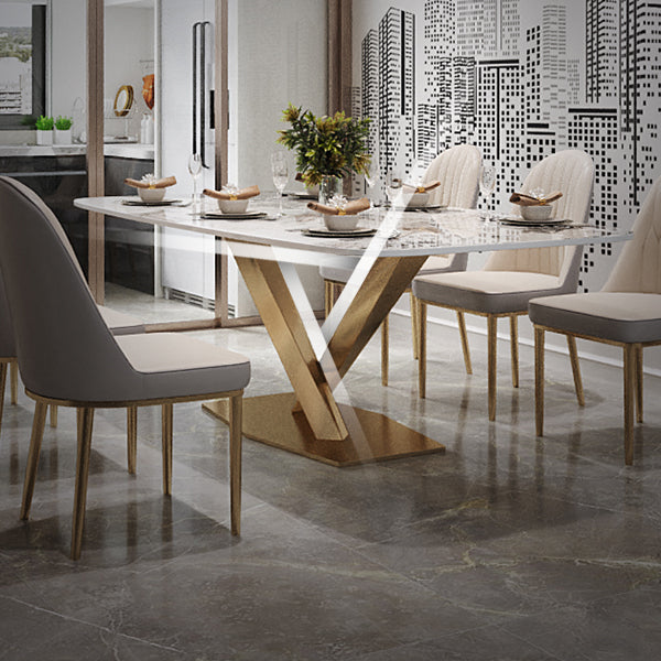 Mesa de comedor rectangular de lujo tradicional de metal, mesa superior de piedra sinterizada con base de pedestal