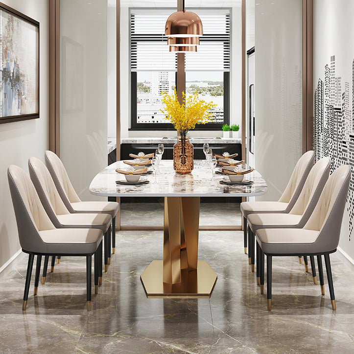 Mesa de comedor rectangular de lujo tradicional de metal, mesa superior de piedra sinterizada con base de pedestal