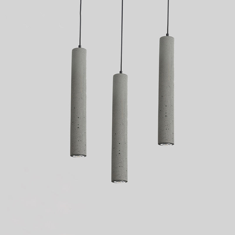 Graue zylindrische LED -Pendelleuchte im modernen künstlerischen Zementlampe für Esszimmer