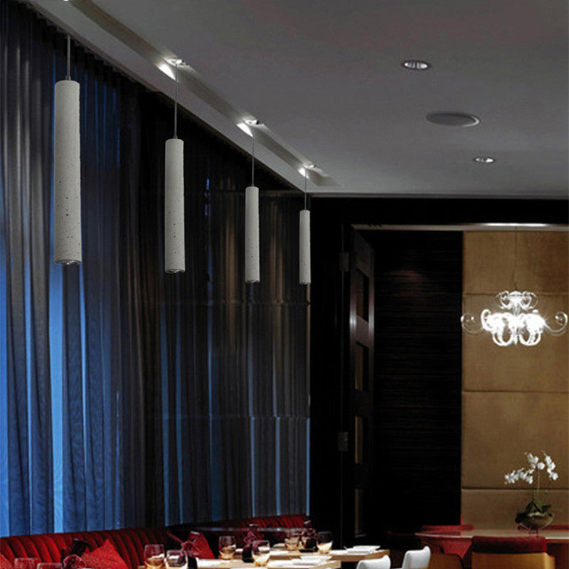 Graue zylindrische LED -Pendelleuchte im modernen künstlerischen Zementlampe für Esszimmer