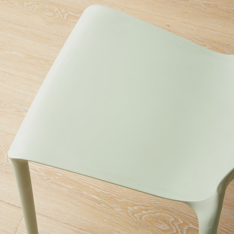 Scandinavian Armless Dining Chairs Plastic Indoor Stackable Solid Back Side Chair