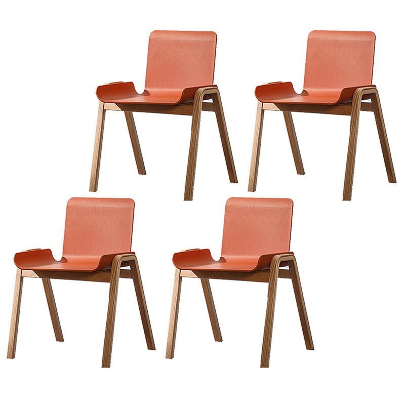 Sillón de comedor apilable escandinavo con respaldo macizo y patas de madera