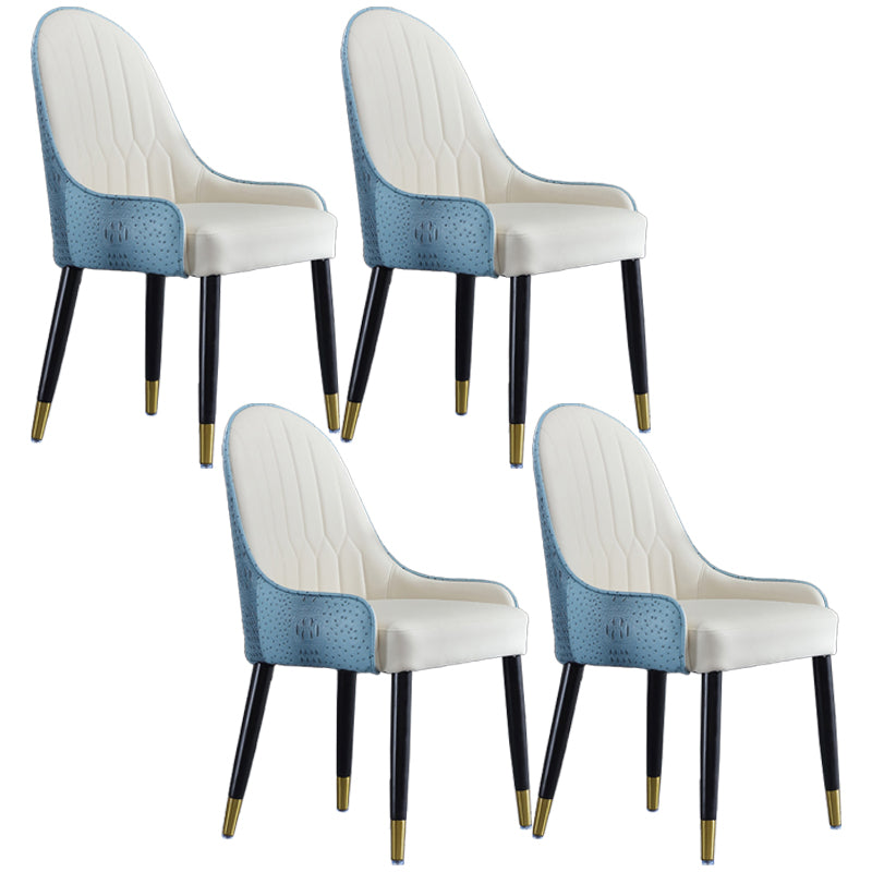 El comedor de madera contemporáneo preside los sillones laterales tapizados para el uso en el hogar