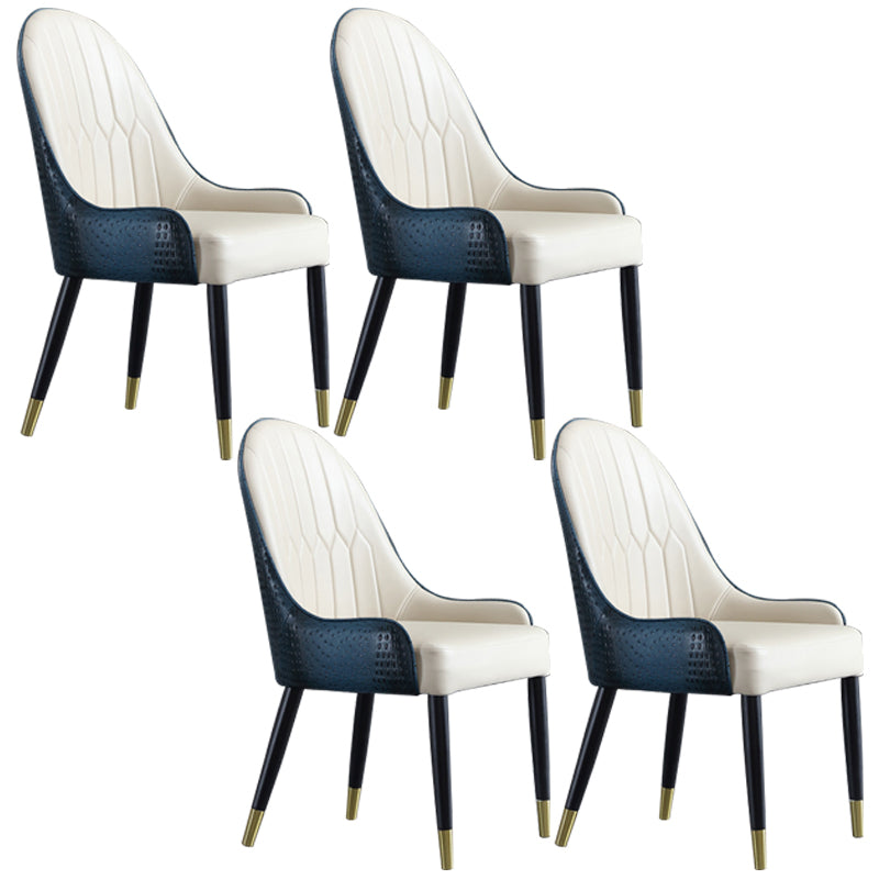 El comedor de madera contemporáneo preside los sillones laterales tapizados para el uso en el hogar