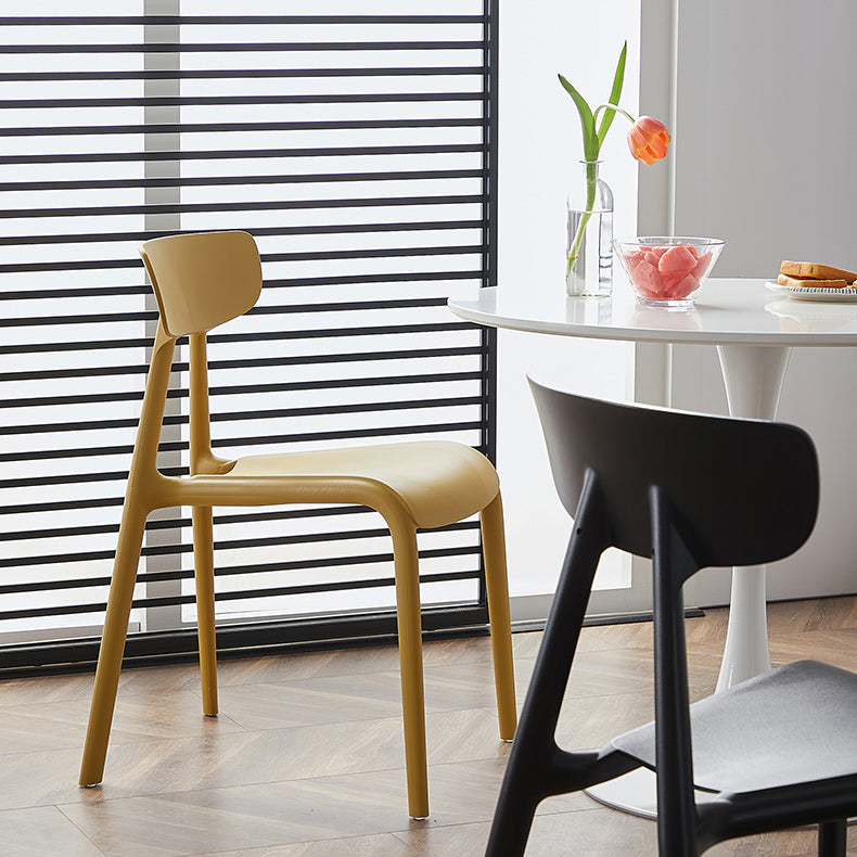 Minimalistische stijl Plastic armloze stoel Open achterste Dining zijstoel voor thuisgebruik