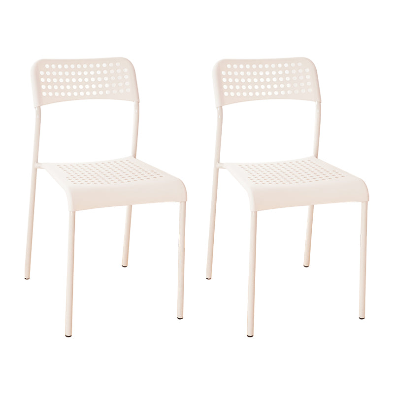 El comedor contemporáneo del metal preside la parte posterior abierta plástica que cena la silla sin brazos lateral