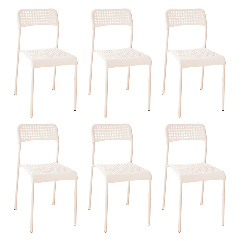 El comedor contemporáneo del metal preside la parte posterior abierta plástica que cena la silla sin brazos lateral