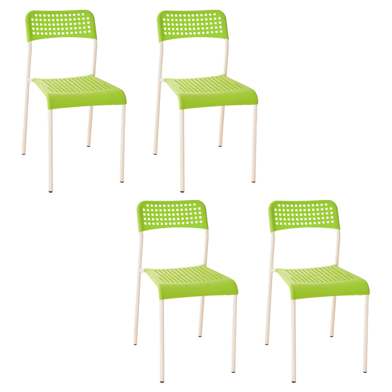 El comedor contemporáneo del metal preside la parte posterior abierta plástica que cena la silla sin brazos lateral