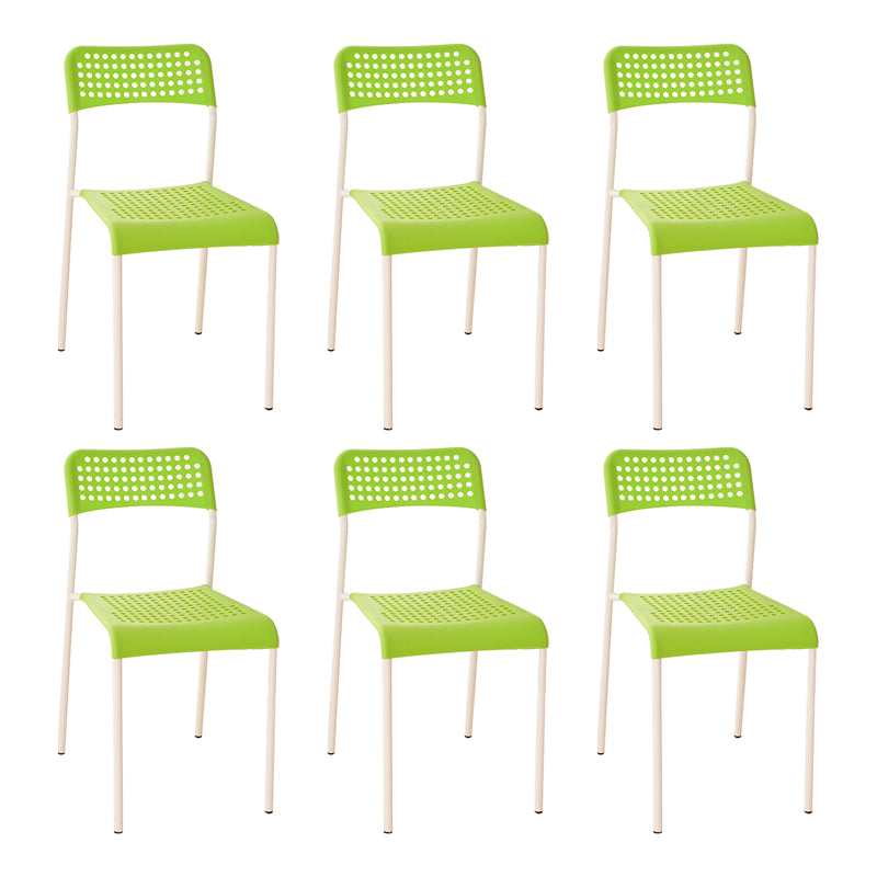 El comedor contemporáneo del metal preside la parte posterior abierta plástica que cena la silla sin brazos lateral