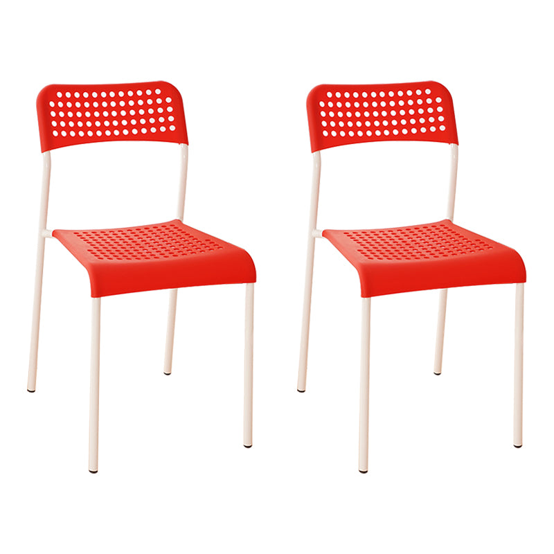 El comedor contemporáneo del metal preside la parte posterior abierta plástica que cena la silla sin brazos lateral