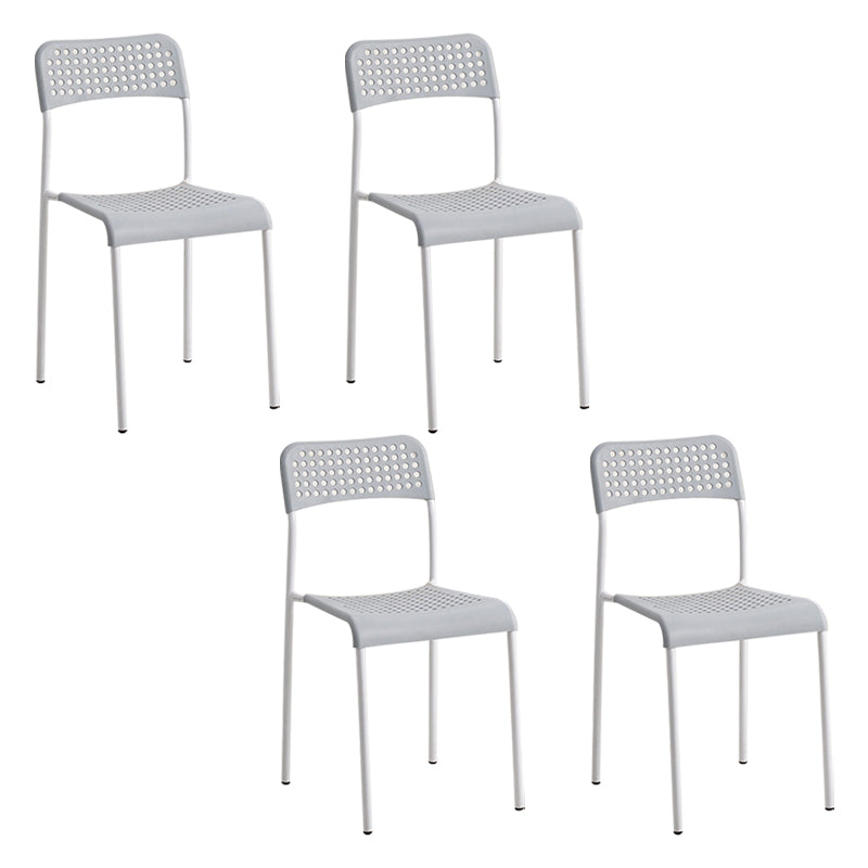 El comedor contemporáneo del metal preside la parte posterior abierta plástica que cena la silla sin brazos lateral