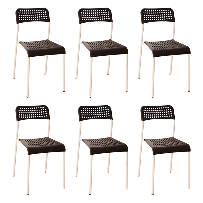 El comedor contemporáneo del metal preside la parte posterior abierta plástica que cena la silla sin brazos lateral