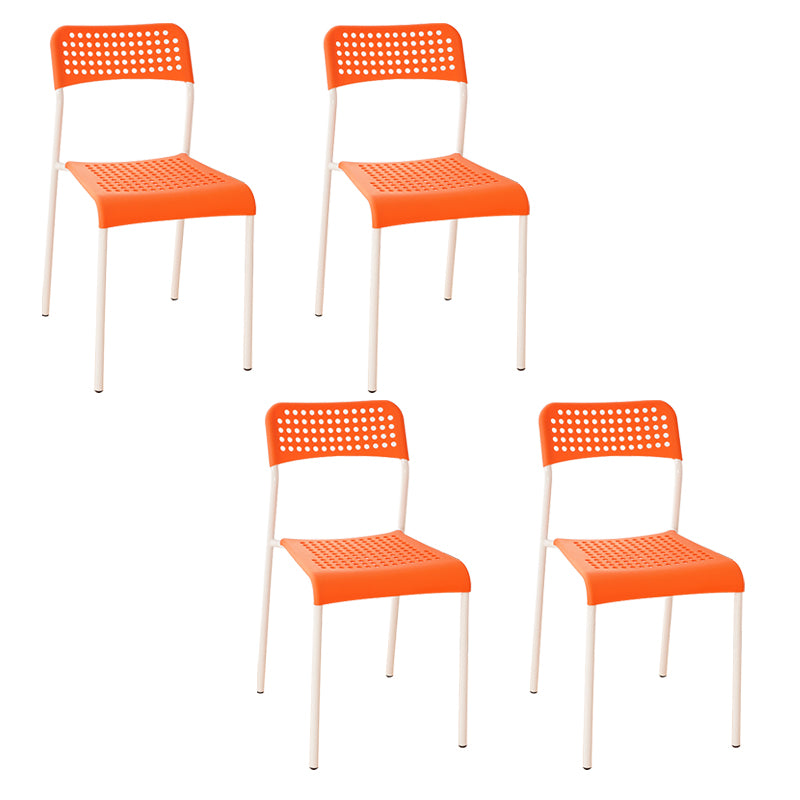 El comedor contemporáneo del metal preside la parte posterior abierta plástica que cena la silla sin brazos lateral