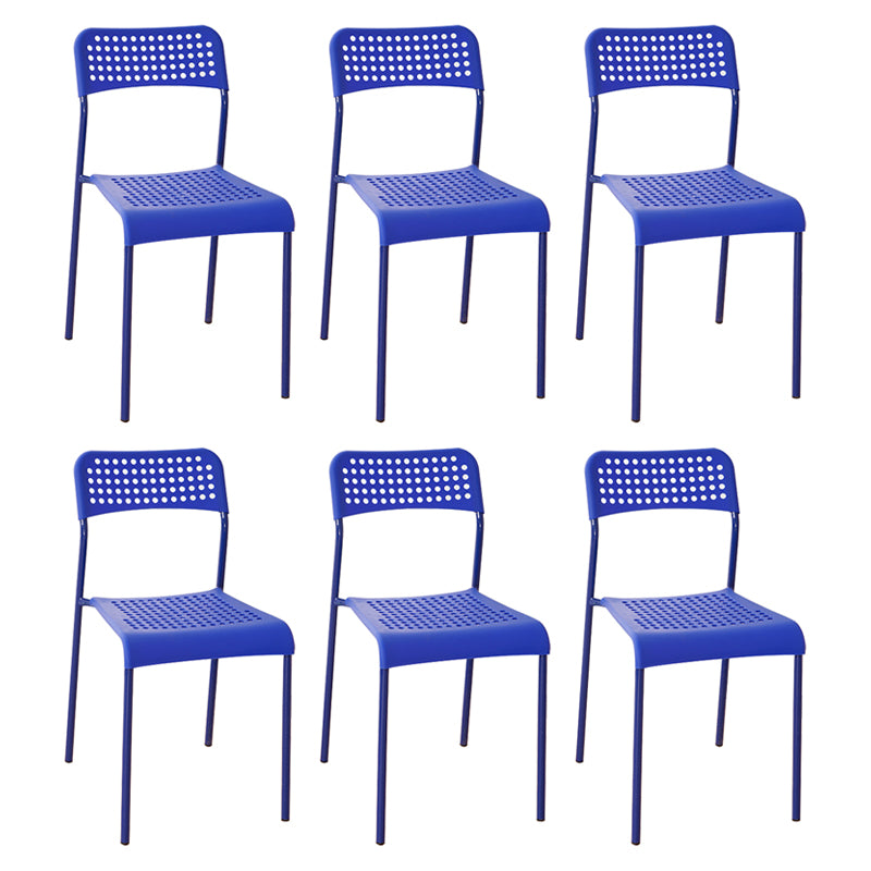 El comedor contemporáneo del metal preside la parte posterior abierta plástica que cena la silla sin brazos lateral