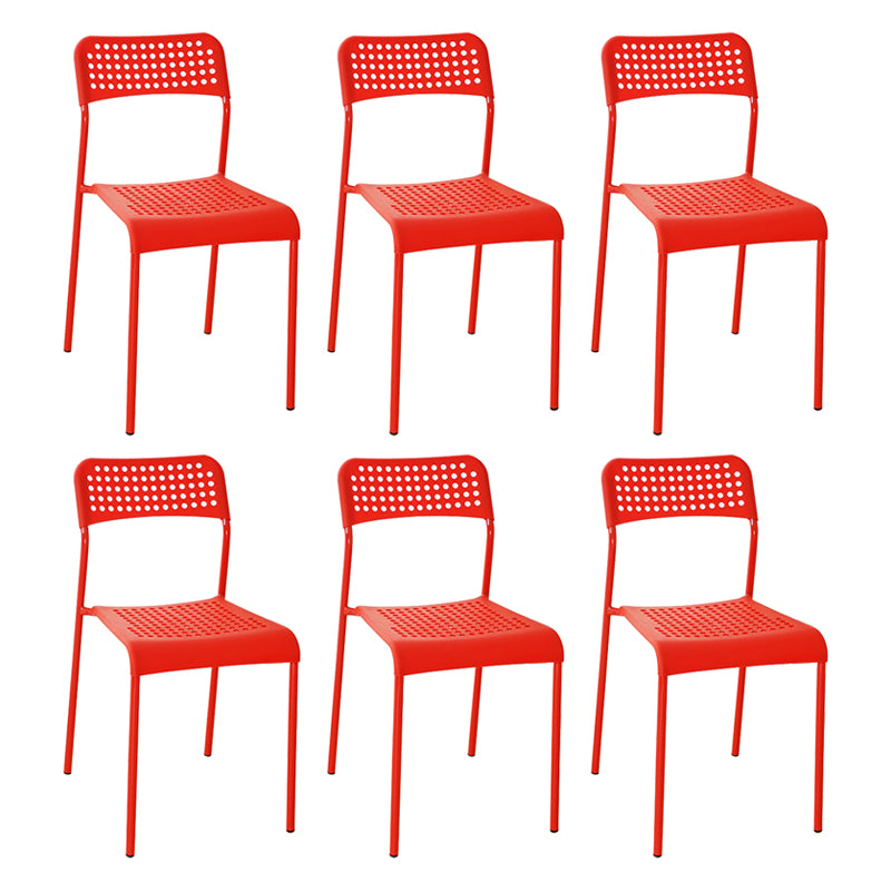 El comedor contemporáneo del metal preside la parte posterior abierta plástica que cena la silla sin brazos lateral