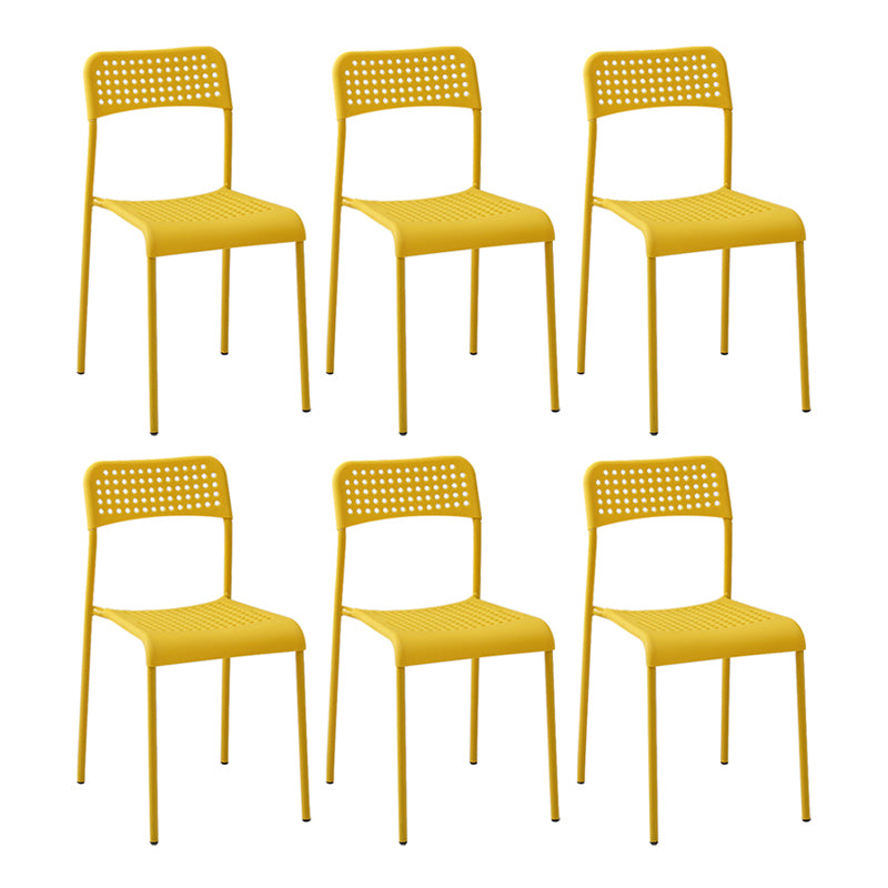 El comedor contemporáneo del metal preside la parte posterior abierta plástica que cena la silla sin brazos lateral