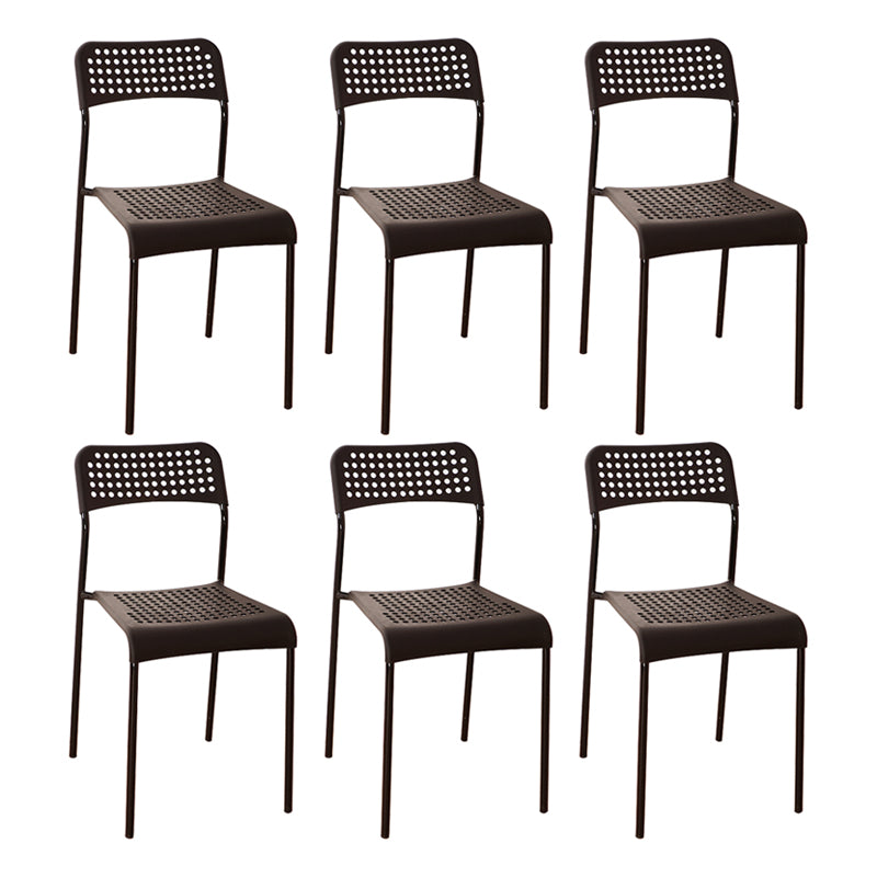 El comedor contemporáneo del metal preside la parte posterior abierta plástica que cena la silla sin brazos lateral