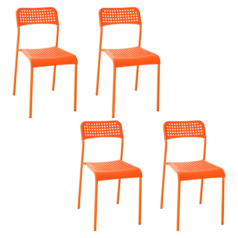 El comedor contemporáneo del metal preside la parte posterior abierta plástica que cena la silla sin brazos lateral