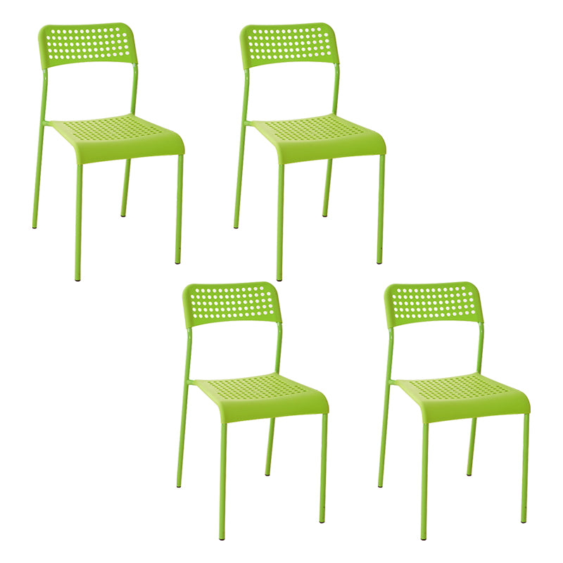 El comedor contemporáneo del metal preside la parte posterior abierta plástica que cena la silla sin brazos lateral