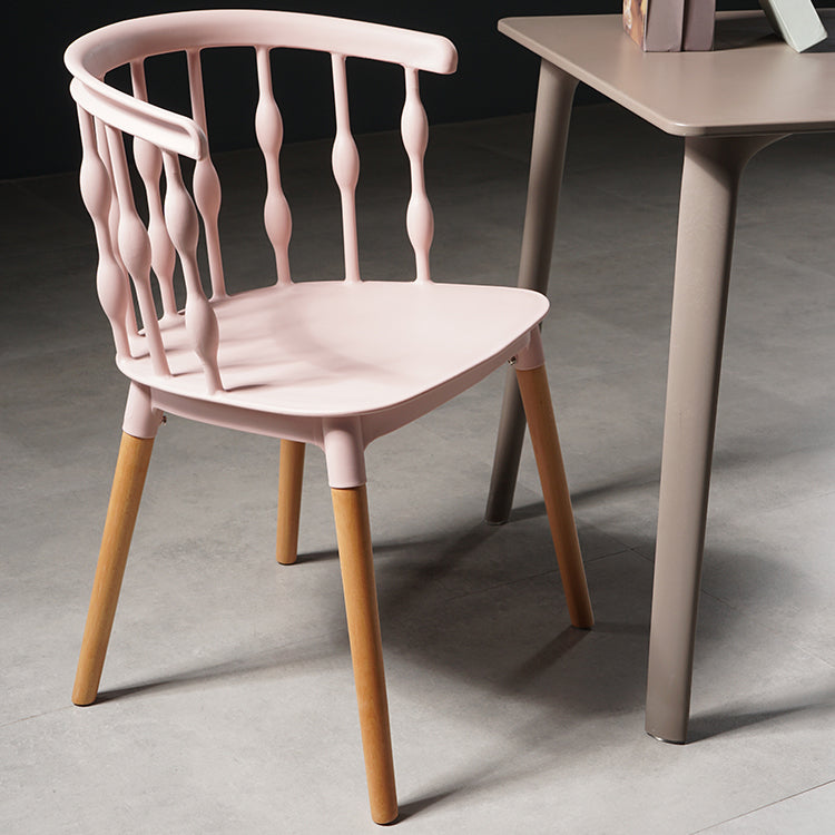 Sillas de comedor estilo moderno Sillas sin brazos de plástico con patas de madera