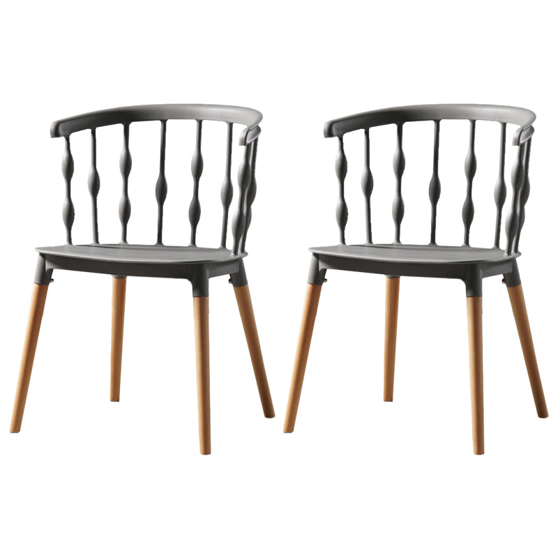 Sillas de comedor estilo moderno Sillas sin brazos de plástico con patas de madera