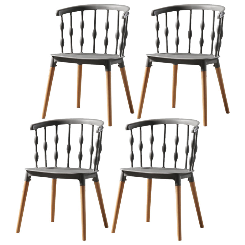 Sillas de comedor estilo moderno Sillas sin brazos de plástico con patas de madera