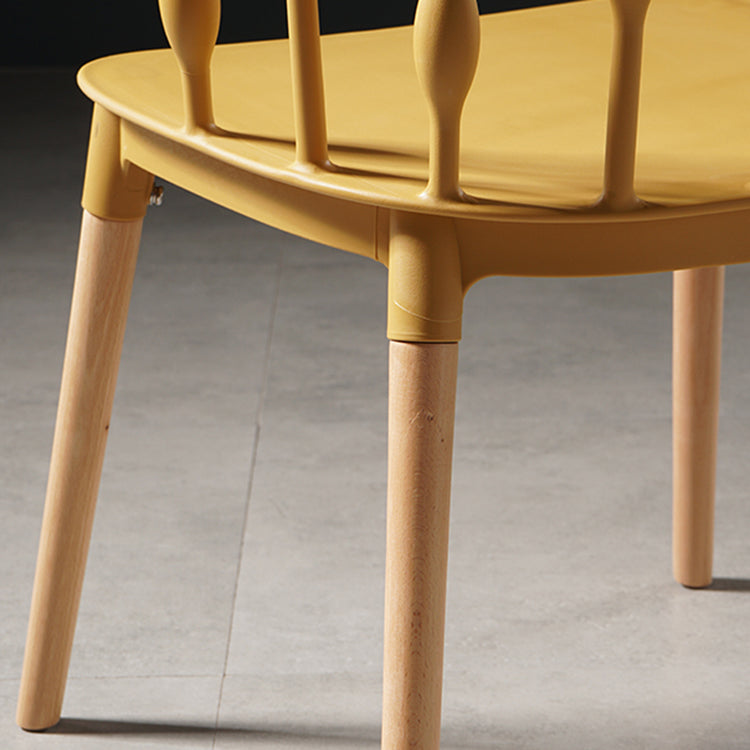 Sillas de comedor estilo moderno Sillas sin brazos de plástico con patas de madera