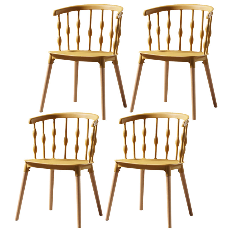 Sillas de comedor estilo moderno Sillas sin brazos de plástico con patas de madera
