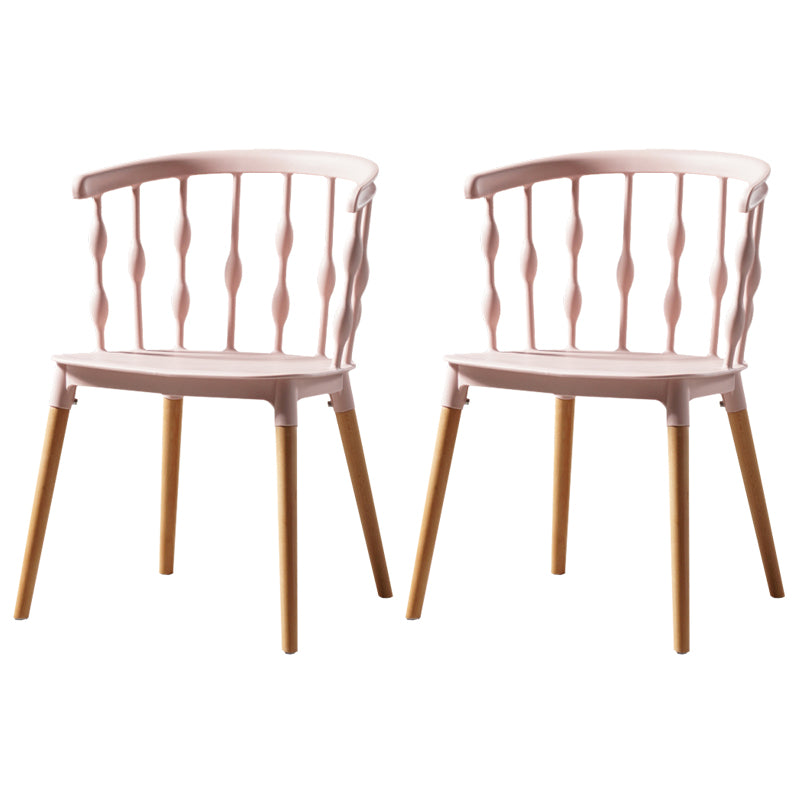 Sillas de comedor estilo moderno Sillas sin brazos de plástico con patas de madera