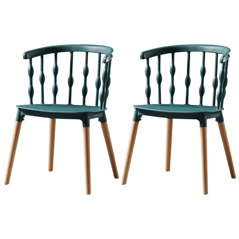 Sillas de comedor estilo moderno Sillas sin brazos de plástico con patas de madera