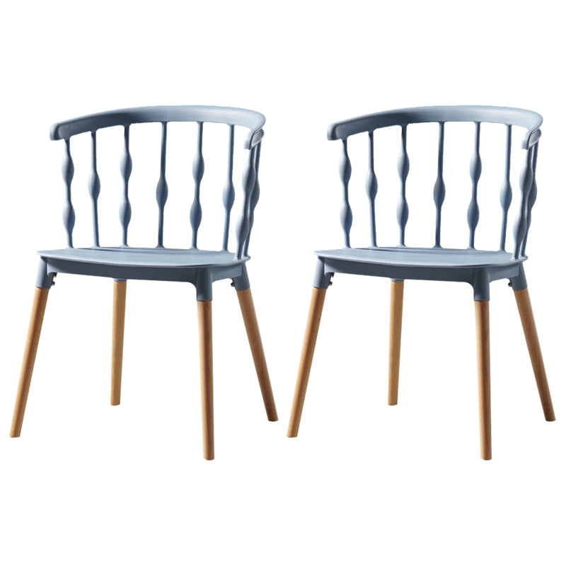 Sillas de comedor estilo moderno Sillas sin brazos de plástico con patas de madera