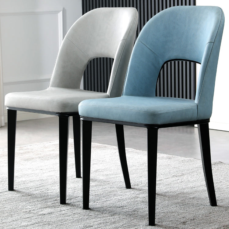 Silla de comedor contemporánea con acabado mate, respaldo abierto de cuero, silla lateral