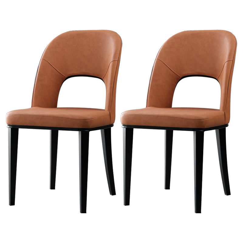 Silla de comedor contemporánea con acabado mate, respaldo abierto de cuero, silla lateral