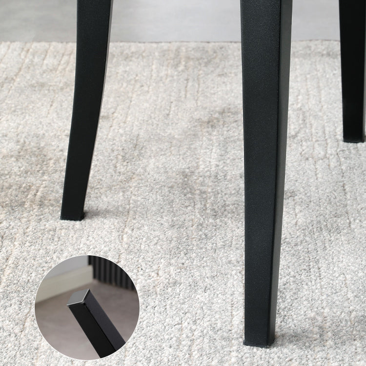 Silla de comedor contemporánea con acabado mate, respaldo abierto de cuero, silla lateral