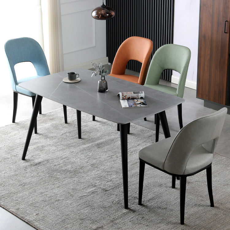 Silla de comedor contemporánea con acabado mate, respaldo abierto de cuero, silla lateral