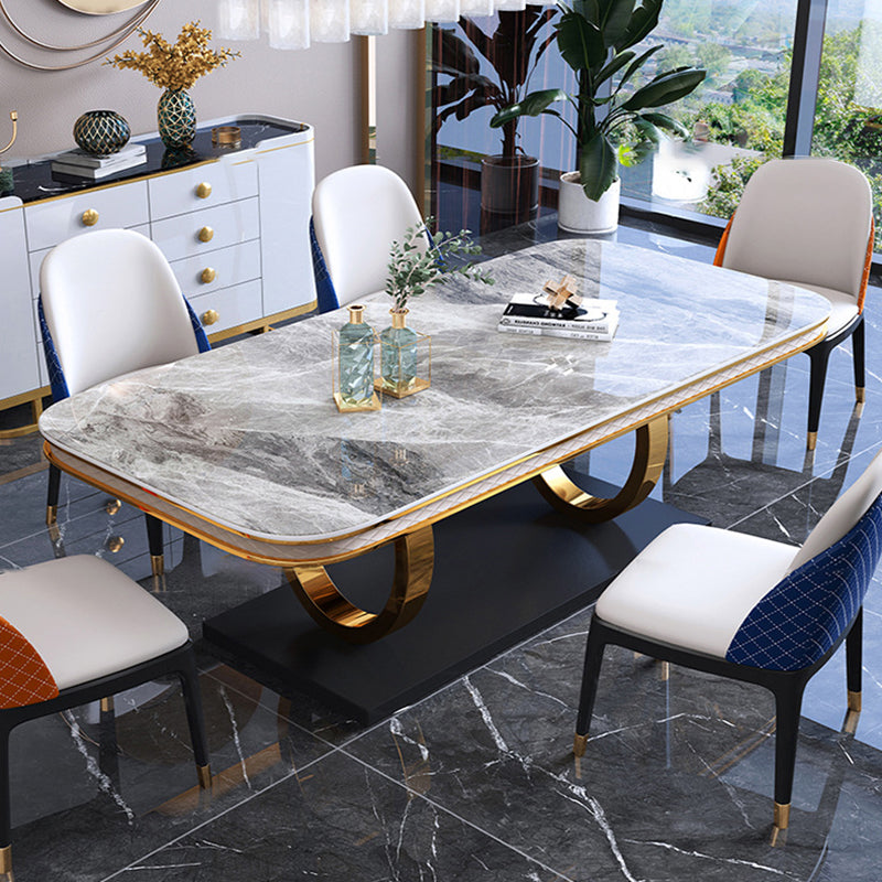 Mesa de comedor de piedra sinterizada de lujo, mesa rectangular con pedestal de metal dorado