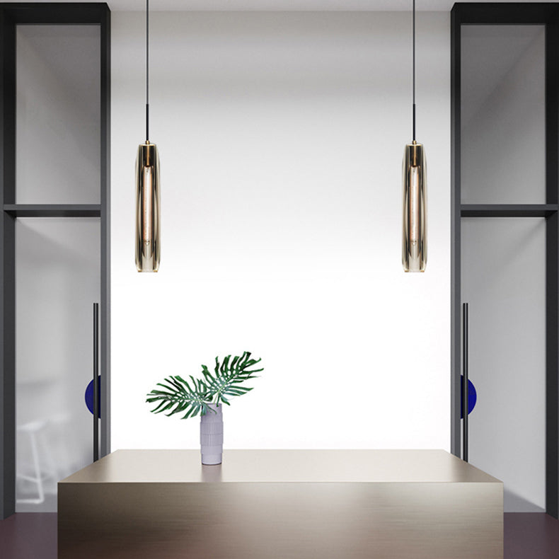 Lámpara colgante cilíndrica de cobre ligero de un solo colgante artístico moderno con sombra de cristal