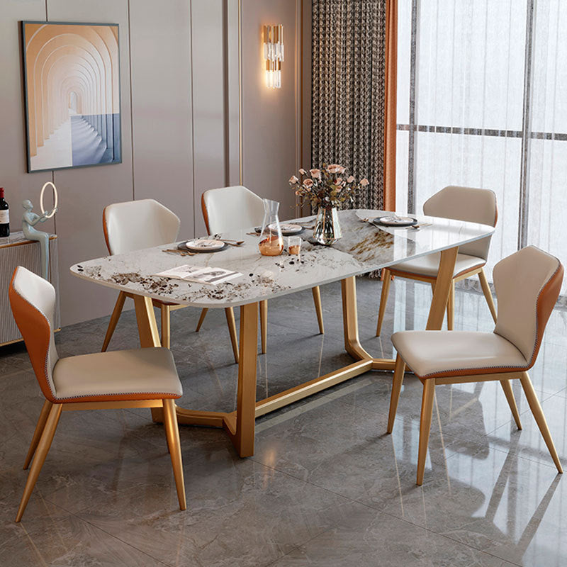 Mesa de comedor de piedra sinterizada de lujo tradicional mesa rectángulo con base de caballete dorado