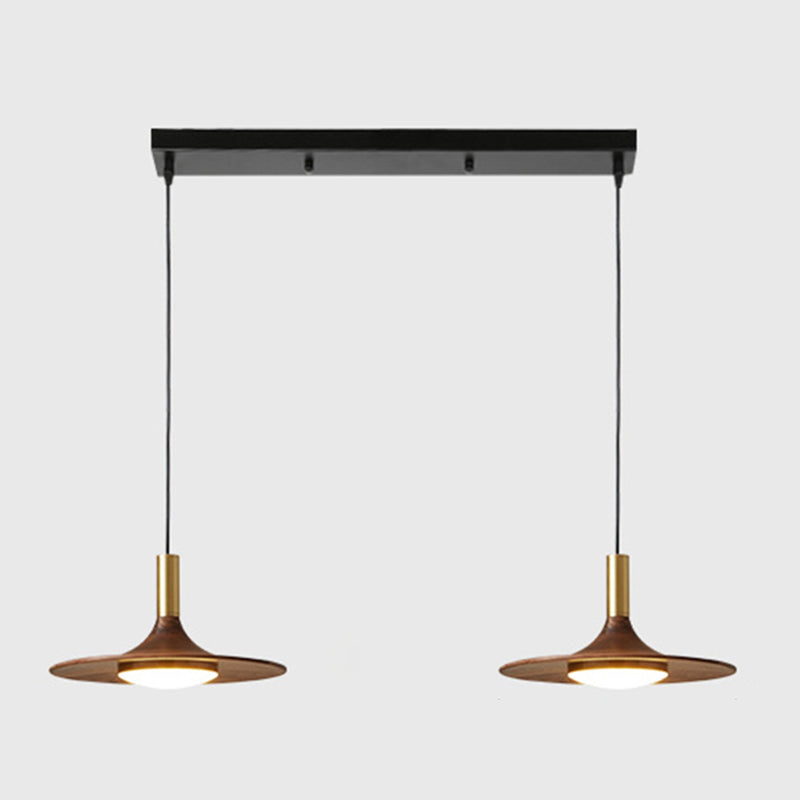 Le lampadario a sospensione a sospensione contemporanea con tonalità piatto in legno.
