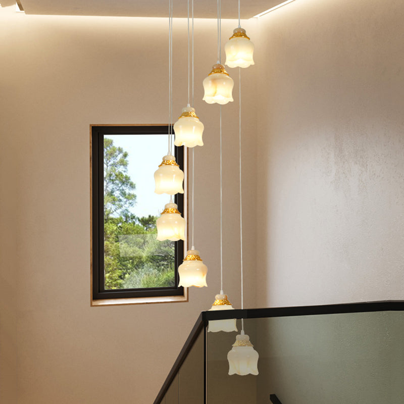 White Glass Floral Cluster Pendant Light Modernism 8 Lights Stair Hanging Lamp in Gold