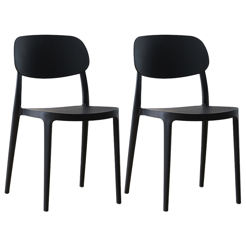 Silla lateral abierta apilable de cena sin brazos del plástico escandinavo de las sillas