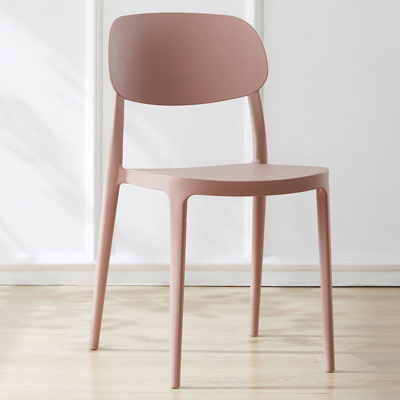 Silla lateral abierta apilable de cena sin brazos del plástico escandinavo de las sillas