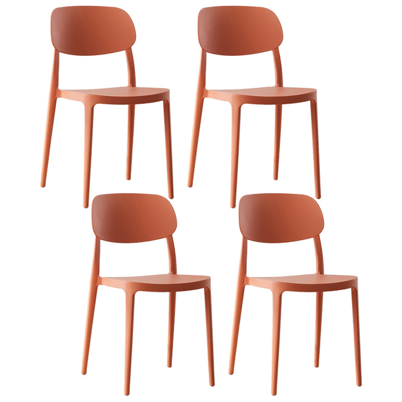 Silla lateral abierta apilable de cena sin brazos del plástico escandinavo de las sillas