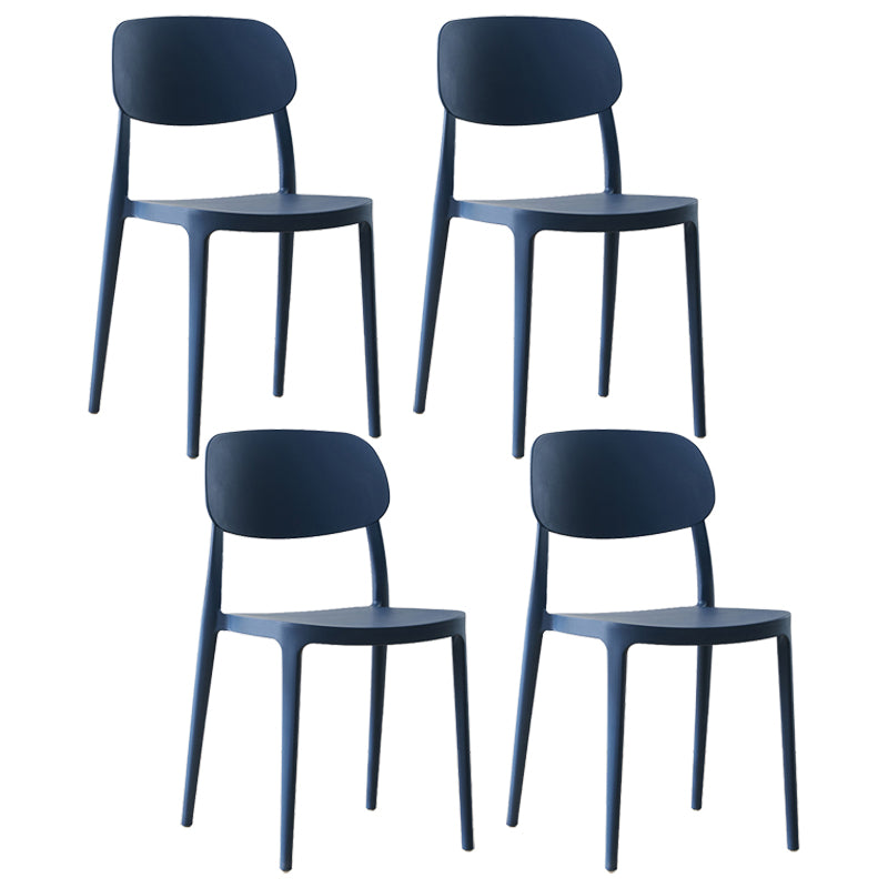 Silla lateral abierta apilable de cena sin brazos del plástico escandinavo de las sillas